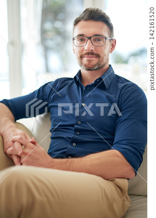 Portrait, confident or man to relax on sofa in weekend, break or getaway to dream destination. Businessman, ambition or vision of leisure, recreation or satisfaction on vacation for stress relief Portrait, confident or man to relax on sofa in weekend, break or getaway to dream destination. Businessman, ambition or vision of leisure, recreation or satisfaction on vacation for stress relief 142161520