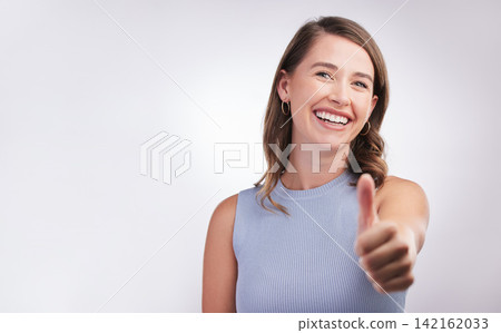 Thumbs up, agreement and portrait of happy woman in studio mockup with positive attitude. Thank you, smile and girl with yes hand gesture for success emoji, praise and achievement on white background Thumbs up, agreement and portrait of happy woman in studio mockup with positive attitude. Thank you, smile and girl with yes hand gesture for success emoji, praise and achievement on white background 142162033