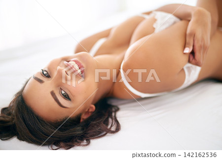 Sexy, lingerie and portrait of woman on bed in fashion, underwear or confident in style at home. Happy, model or morning in bedroom with bra and relax in luxury bikini or sensual aesthetic with pride Sexy, lingerie and portrait of woman on bed in fashion, underwear or confident in style at home. Happy, model or morning in bedroom with bra and relax in luxury bikini or sensual aesthetic with pride 142162536
