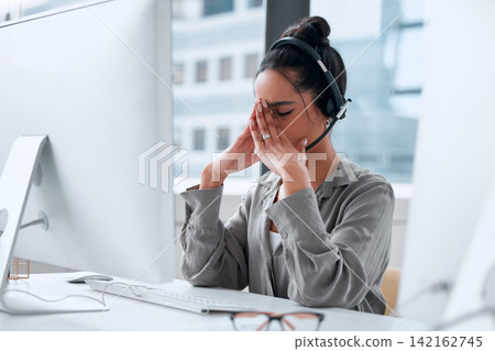 Call center, stress and woman advisor in office for online crm consultation or enquiries. Telemarketing, headache and female technical support or customer service consultant with desktop in workplace 142162745