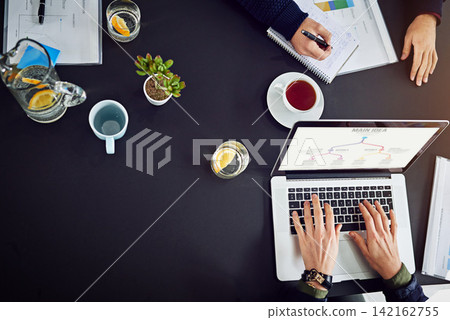 Hands, laptop and top view of meeting for planning, mindmap and team brainstorming for SEO project. Collaboration, research and info on flow chart, people and digital marketing strategy at startup Hands, laptop and top view of meeting for planning, mindmap and team brainstorming for SEO project. Collaboration, research and info on flow chart, people and digital marketing strategy at startup 142162755
