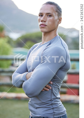 Fitness, man and arms crossed portrait outdoor on break from workout, sport training and exercise in nature. Serious, bodybuilder and confidence from health and wellness in Brazil with strong athlete Fitness, man and arms crossed portrait outdoor on break from workout, sport training and exercise in nature. Serious, bodybuilder and confidence from health and wellness in Brazil with strong athlete 142163202