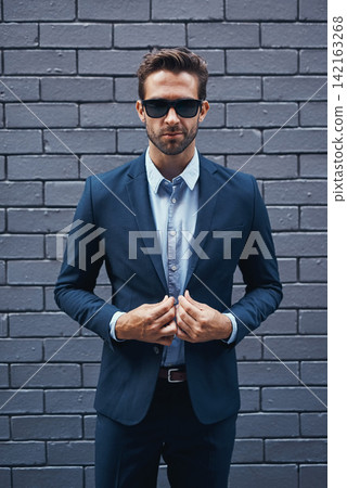 Businessman, bricks and trendy with suit and confident for fashion, clothing or clothes and cool. Male lawyer, backdrop and stylish or edgy for career with corporate, funky with sunglasses in Seattle Businessman, bricks and trendy with suit and confident for fashion, clothing or clothes and cool. Male lawyer, backdrop and stylish or edgy for career with corporate, funky with sunglasses in Seattle 142163268