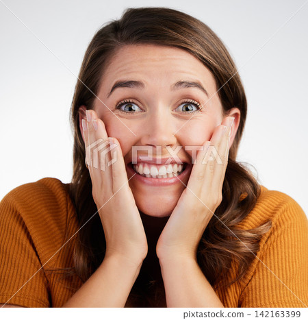 Happy woman, portrait and surprise with good news for prize, announcement or offer on a white studio background. Face of excited female person with big smile in wow, happiness or amazing reaction Happy woman, portrait and surprise with good news for prize, announcement or offer on a white studio background. Face of excited female person with big smile in wow, happiness or amazing reaction 142163399