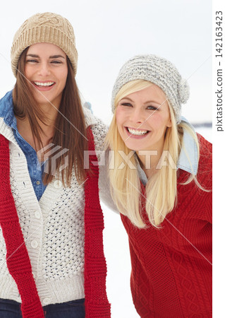 Portrait, lesbian couple and snow in winter on holiday is Alaska for Christmas, festive and travel for bonding. Cheerful, women and laugh with happiness, fun and love for vacation, break or retreat Portrait, lesbian couple and snow in winter on holiday is Alaska for Christmas, festive and travel for bonding. Cheerful, women and laugh with happiness, fun and love for vacation, break or retreat 142163423