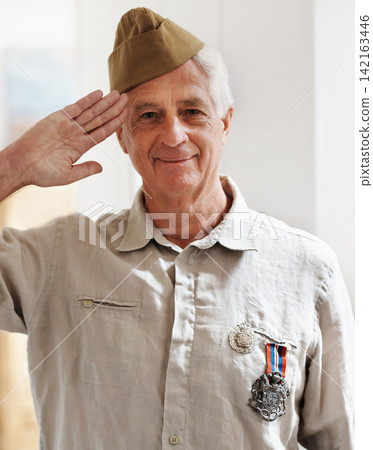 Mature man, war and hero in retirement with service, medals and uniform as soldier or patriot.Senior person, army and veteran in portrait for memories, pride and respect in salute for remembering Mature man, war and hero in retirement with service, medals and uniform as soldier or patriot.Senior person, army and veteran in portrait for memories, pride and respect in salute for remembering 142163446