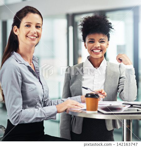 Diverse team, women and collaboration with smiling in portrait for meeting, chat and notes at table. Corporate colleagues, teamwork and happy in workplace for discussion, mission and company goal Diverse team, women and collaboration with smiling in portrait for meeting, chat and notes at table. Corporate colleagues, teamwork and happy in workplace for discussion, mission and company goal 142163747