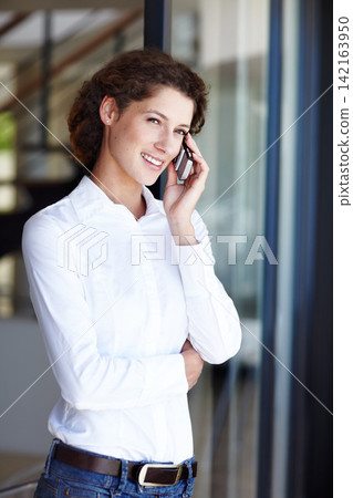 Business woman, smile and phone call with mobile consultation in office at window. Startup, entrepreneur and employee with conversation, networking and communication for public relations at company Business woman, smile and phone call with mobile consultation in office at window. Startup, entrepreneur and employee with conversation, networking and communication for public relations at company 142163950