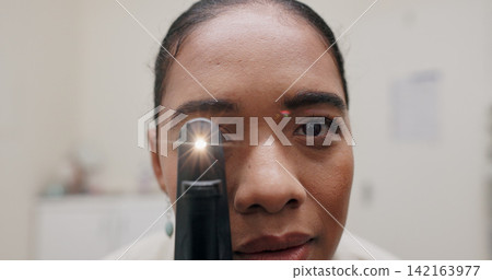 Woman, light and ophthalmoscope in clinic for eye exam, eye care and vision. Specialist, optometrist and testing tools in workplace for eyesight, healthcare and prescription for glaucoma or disease Woman, light and ophthalmoscope in clinic for eye exam, eye care and vision. Specialist, optometrist and testing tools in workplace for eyesight, healthcare and prescription for glaucoma or disease 142163977