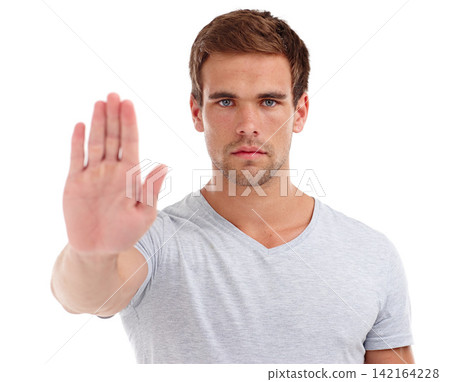 Stop, serious and portrait of man on a white background for problem, prohibition and conflict. Anger, reject and isolated person with hand sign, palm and gesture in studio with frustrated reaction Stop, serious and portrait of man on a white background for problem, prohibition and conflict. Anger, reject and isolated person with hand sign, palm and gesture in studio with frustrated reaction 142164228