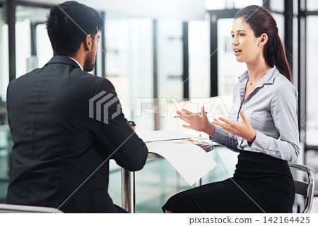 Woman, man and meeting in office for business, startup and planning with teamwork in workplace. Partnership, collaboration and documents for strategy, report and talking in corporate company Woman, man and meeting in office for business, startup and planning with teamwork in workplace. Partnership, collaboration and documents for strategy, report and talking in corporate company 142164425