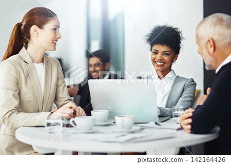 Businesswoman, portrait and laptop in office with diversity, coffee and meeting for startup company. Teamwork, business and collaboration and technology for research, planning and brainstorming 142164426