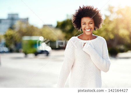 Girl, portrait and happy in street, outdoor and smile in urban, fashion and natural hair. Winter wear, afro and happiness or african woman, road and confident in cheerful, vacation and relax or joy Girl, portrait and happy in street, outdoor and smile in urban, fashion and natural hair. Winter wear, afro and happiness or african woman, road and confident in cheerful, vacation and relax or joy 142164427