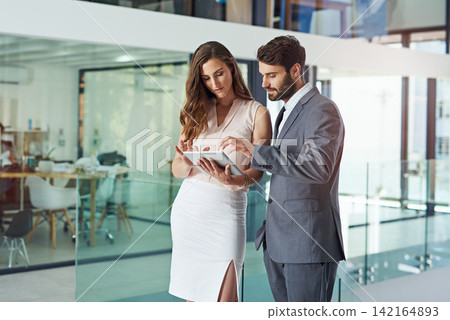 Happy, business people and tablet for communication, collaboration and discussion on company report. Meeting, corporate man and woman with tech for conversation, planning and review in office Happy, business people and tablet for communication, collaboration and discussion on company report. Meeting, corporate man and woman with tech for conversation, planning and review in office 142164893