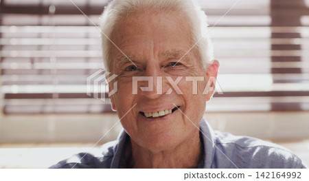 Senior man, portrait and closeup in house with smile for retirement, memories and happiness. Elderly person, face and relax in nursing home on pension for fathers day, peace and calm with comfort Senior man, portrait and closeup in house with smile for retirement, memories and happiness. Elderly person, face and relax in nursing home on pension for fathers day, peace and calm with comfort 142164992
