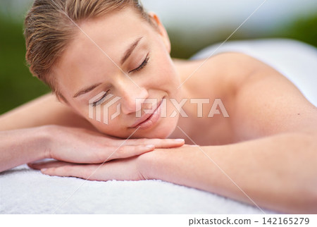 Massage, woman and spa for detox, wellness and relaxation in muscles, back and neck for self care. Female person, physical therapy and health for body with smile, calm and happiness on holiday Massage, woman and spa for detox, wellness and relaxation in muscles, back and neck for self care. Female person, physical therapy and health for body with smile, calm and happiness on holiday 142165279