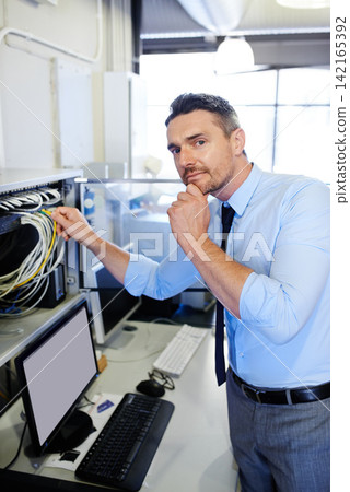 Portrait, man or technician thinking of office cables for computer glitch, backup or hardware cords. Ideas, programmer or engineer fixing wires for information technology, engineering or IT support 142165392