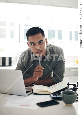 Thinking, man and laptop in kitchen portrait for planning, finances or investment budget for home maintenance. Person, contemplating and making notes in book for expenses, earnings and savings Thinking, man and laptop in kitchen portrait for planning, finances or investment budget for home maintenance. Person, contemplating and making notes in book for expenses, earnings and savings 142165723