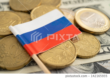 Stack of coins with Russia flag and US dollar banknotes. Stack of coins with Russia flag and US dollar banknotes. 142165935