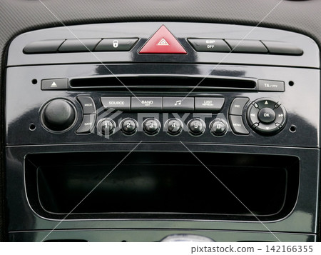 Car radio console interface with buttons and volume control. Vehicle dashboard audio system panel design element for interior technology, transportation engineering and automobile travel. Car radio console interface with buttons and volume control. Vehicle dashboard audio system panel design element for interior technology, transportation engineering and automobile travel. 142166355
