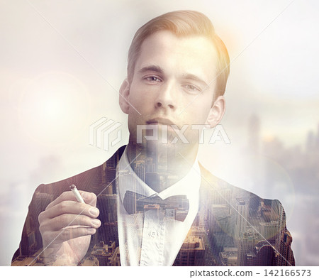 Cigarette, portrait and gentleman with city overlay in suit for vintage, stylish and elegant fashion. Nicotine, bowtie and male person smoking in tuxedo for luxury aesthetic with town double exposure Cigarette, portrait and gentleman with city overlay in suit for vintage, stylish and elegant fashion. Nicotine, bowtie and male person smoking in tuxedo for luxury aesthetic with town double exposure 142166573