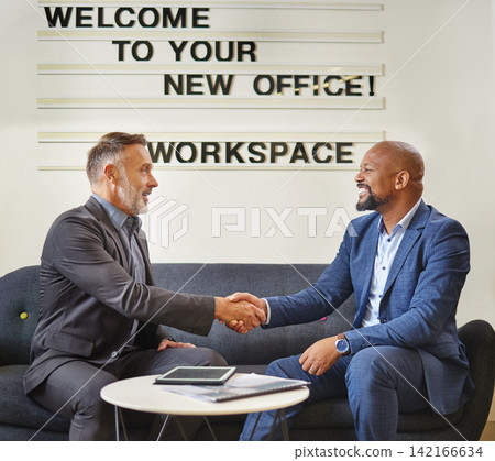 Businessman, handshake and interview with executive at office for partnership, agreement or deal. Man or employee shaking hands with CEO in meeting for hiring, recruiting or b2b on sofa at workplace Businessman, handshake and interview with executive at office for partnership, agreement or deal. Man or employee shaking hands with CEO in meeting for hiring, recruiting or b2b on sofa at workplace 142166634