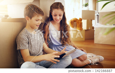 Real estate, box and siblings with tablet on floor of new house for moving, streaming or gaming. Property, renovation and children in dream home living room with app for cartoon, video or movies Real estate, box and siblings with tablet on floor of new house for moving, streaming or gaming. Property, renovation and children in dream home living room with app for cartoon, video or movies 142166887