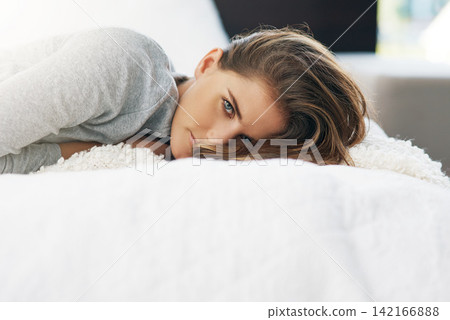 Home, morning and portrait of woman in bed for relaxing, resting and wake up from sleep in bedroom. wellness, house and face of person with cosy blanket on weekend, vacation and break for comfort 142166888