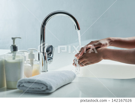 Home, washing hands and person in bathroom for skincare, wellness and hygiene in morning. Healthcare, beauty and arms with liquid, soap and splash for cleaning, hydration and cleansing skin in home Home, washing hands and person in bathroom for skincare, wellness and hygiene in morning. Healthcare, beauty and arms with liquid, soap and splash for cleaning, hydration and cleansing skin in home 142167026