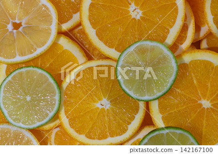 Orange and Lime Wedges Geometric Food Background Orange and Lime Wedges Geometric Food Background 142167100