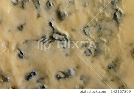Delicious blue cheese with rich flavors and creamy texture invites taste exploration in a culinary delight Delicious blue cheese with rich flavors and creamy texture invites taste exploration in a culinary delight 142167809