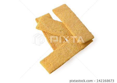 Small pile of crispy cereal or snack bars isolated on white Small pile of crispy cereal or snack bars isolated on white 142168673