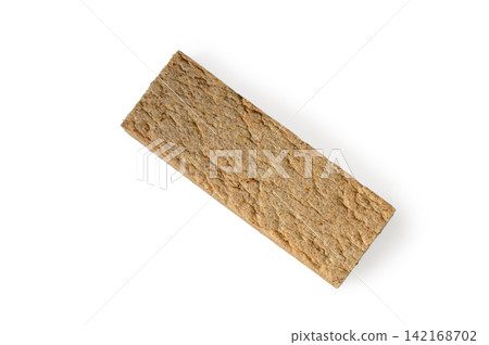 Single rectangular whole grain crispbread on a white background Single rectangular whole grain crispbread on a white background 142168702