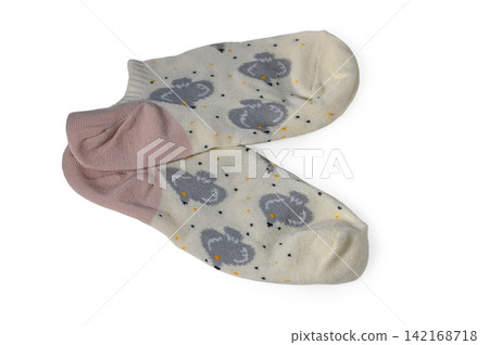 Pair of white ankle socks with grey bird pattern and pink heels isolated on white Pair of white ankle socks with grey bird pattern and pink heels isolated on white 142168718
