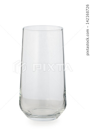 Elegant clear glass tumbler standing tall, ready to hold refreshing beverages for any occasion Elegant clear glass tumbler standing tall, ready to hold refreshing beverages for any occasion 142168726