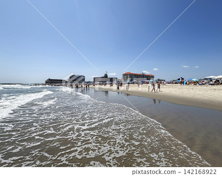 Visitors Walk Along Asbury Park Beach in New Jersey 142168922