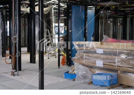 Indoor space and building materials/supplies of a newly constructed apartment building Indoor space and building materials/supplies of a newly constructed apartment building 142169040
