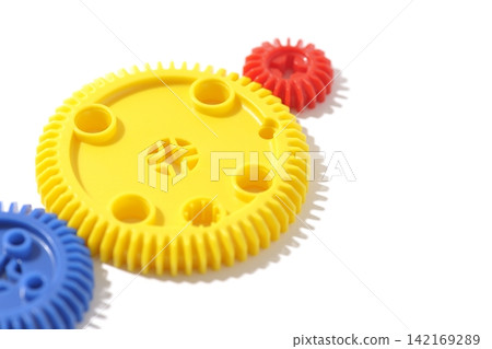 Gears photographed against a white background Gears photographed against a white background 142169289