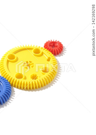 Gears photographed against a white background Gears photographed against a white background 142169298