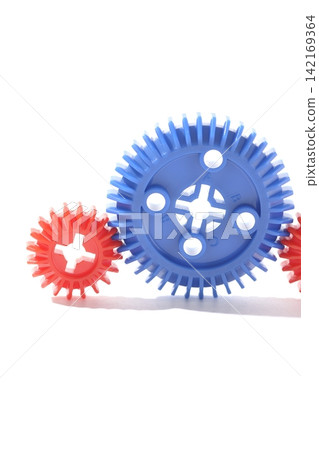 Gears photographed against a white background Gears photographed against a white background 142169364