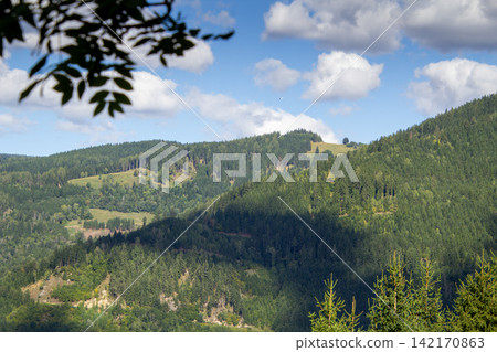 View on the valley and mountains behind Grafendorf. The Gurktaler Alps in Carinthia, Austria. View on the valley and mountains behind Grafendorf. The Gurktaler Alps in Carinthia, Austria. 142170863