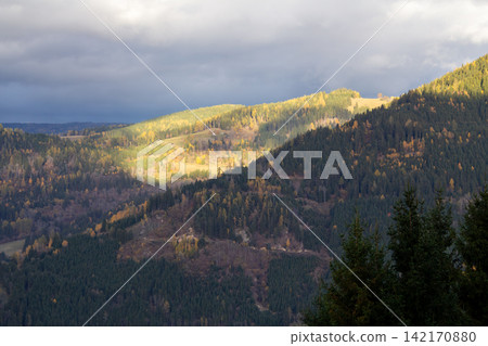 Looking out over the valley and the mountains near Micheldorf en Grafendorf, Carinthia, Austria. Rainstorm over the Gurktal Alps. Looking out over the valley and the mountains near Micheldorf en Grafendorf, Carinthia, Austria. Rainstorm over the Gurktal Alps. 142170880