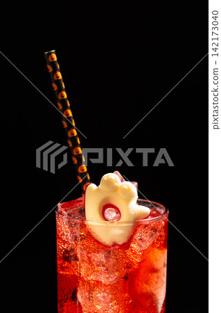 Festive Halloween Cocktail with Themed Straw and Ghost Garnish Perfect for Celebrations and Parties Festive Halloween Cocktail with Themed Straw and Ghost Garnish Perfect for Celebrations and Parties 142173040