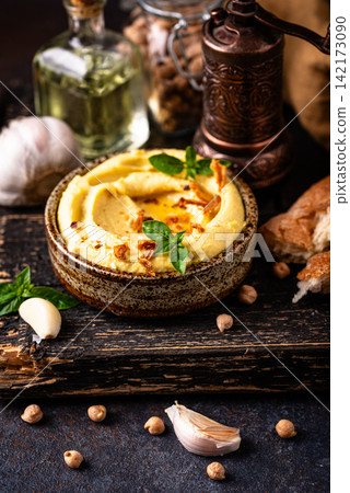 Traditional hummus with chickpeas, paprika, olive oil Traditional hummus with chickpeas, paprika, olive oil 142173090