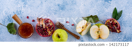 Rosh Hashana concept with honey, apple and pomegranate Rosh Hashana concept with honey, apple and pomegranate 142173117