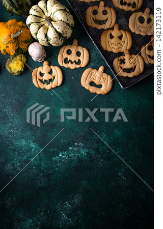 Halloween cookies in shape of jack-o-lantern Halloween cookies in shape of jack-o-lantern 142173119