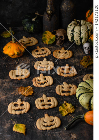 Halloween cookies in shape of jack-o-lantern Halloween cookies in shape of jack-o-lantern 142173120