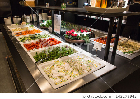 Stockholm, Sweden, December 10 2015: Buffet with salads and food selection in airline lounge 142173942