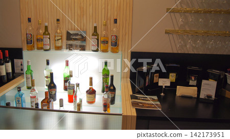 Stockholm, Sweden, December 10 2015: Selection of spirits in airline lounge at Stockholm Arlanda Airport Stockholm, Sweden, December 10 2015: Selection of spirits in airline lounge at Stockholm Arlanda Airport 142173951