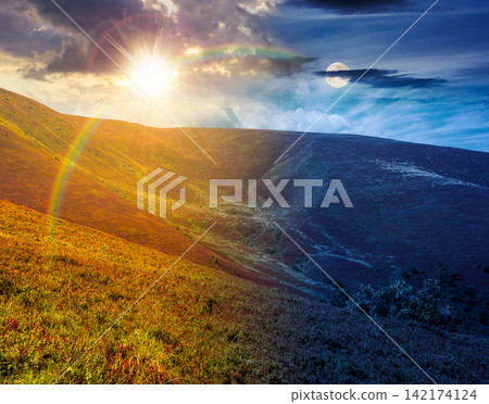 carpathian mountain landscape. travel ukraine on summer solstice. slopes mountain ridge in august at twilight. wonderful carpathian adventure with sun and moon on epic sky carpathian mountain landscape. travel ukraine on summer solstice. slopes mountain ridge in august at twilight. wonderful carpathian adventure with sun and moon on epic sky 142174124